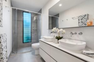 Modern bathroom with grey floor tiles